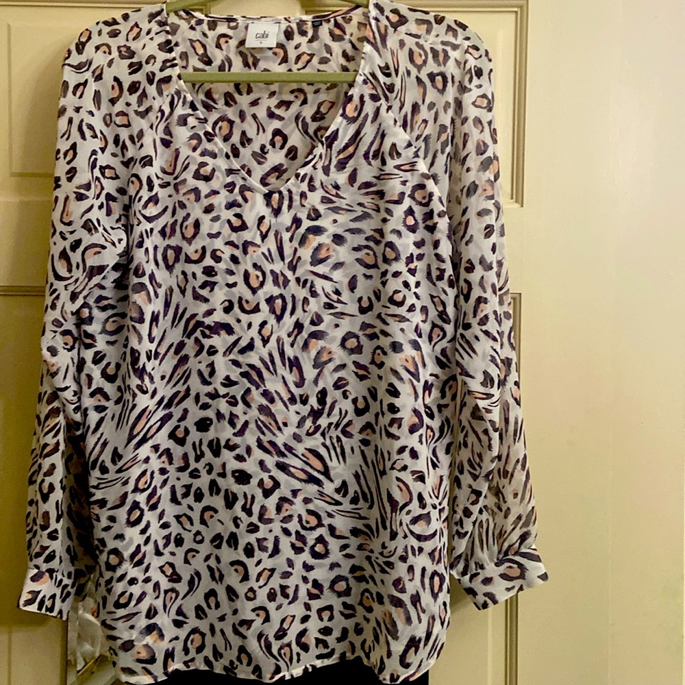 cabi 100% polyester blouse.Beautiful buttons at cuff.